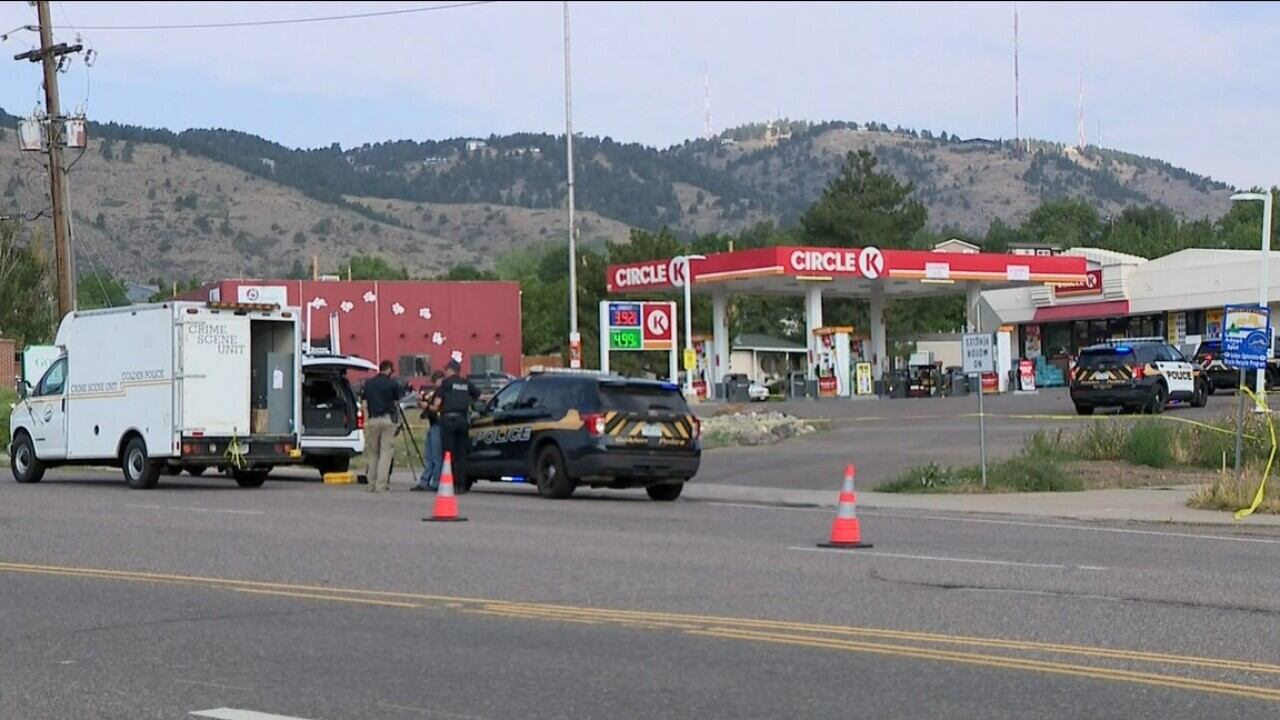 Colorado officer shot while trading fire with armed suspect outside gas station