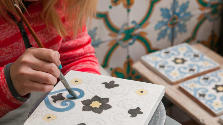 Transform your garden with hand-painted concrete tiles for a cozy ...