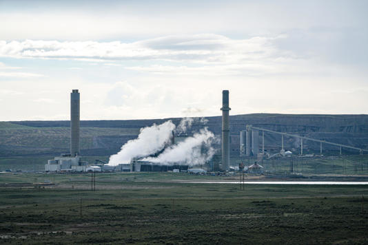 Steam rises from the Naughton power plant near Kemmerer, Wyoming, in a photo taken in May 2026. The power plant was originally powered by coal mined nearby but now makes electricity by burning natural gas. A nuclear power plant is being built a few miles away.