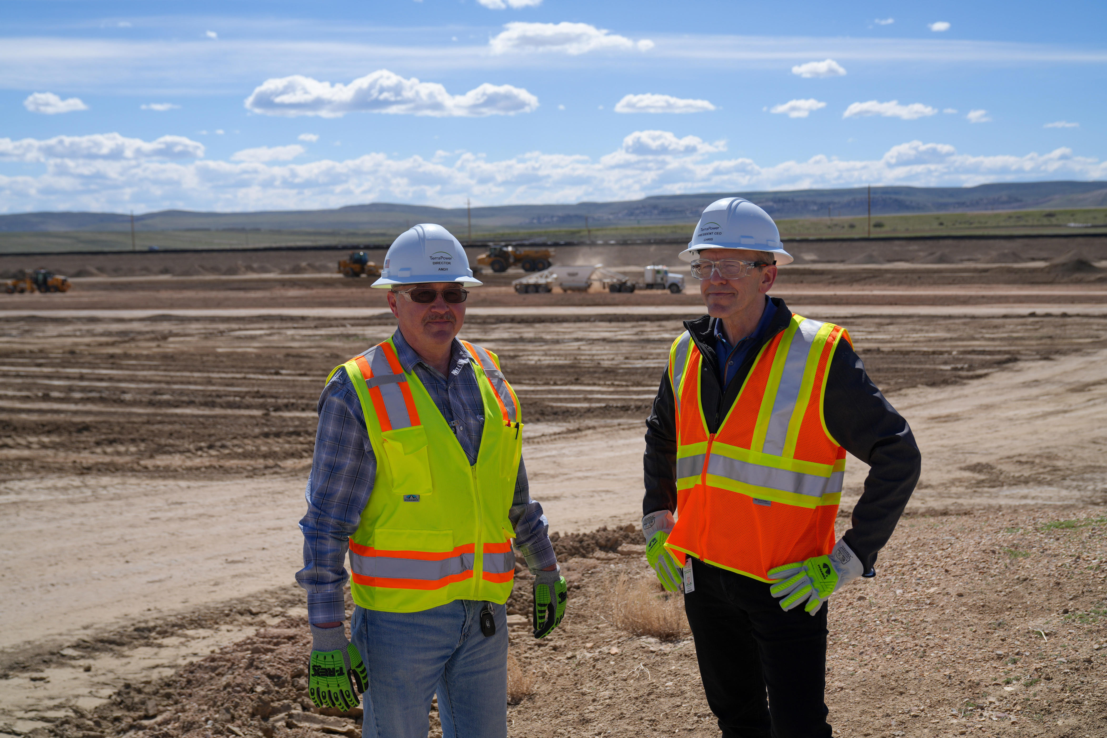 TerraPower Director of Construction Andy Chrusciel, left, and company President and CEO Chris Levesque pose for a photo at the under-construction Natrium nuclear power plant project in Kemmerer, Wyoming, in May 2026.