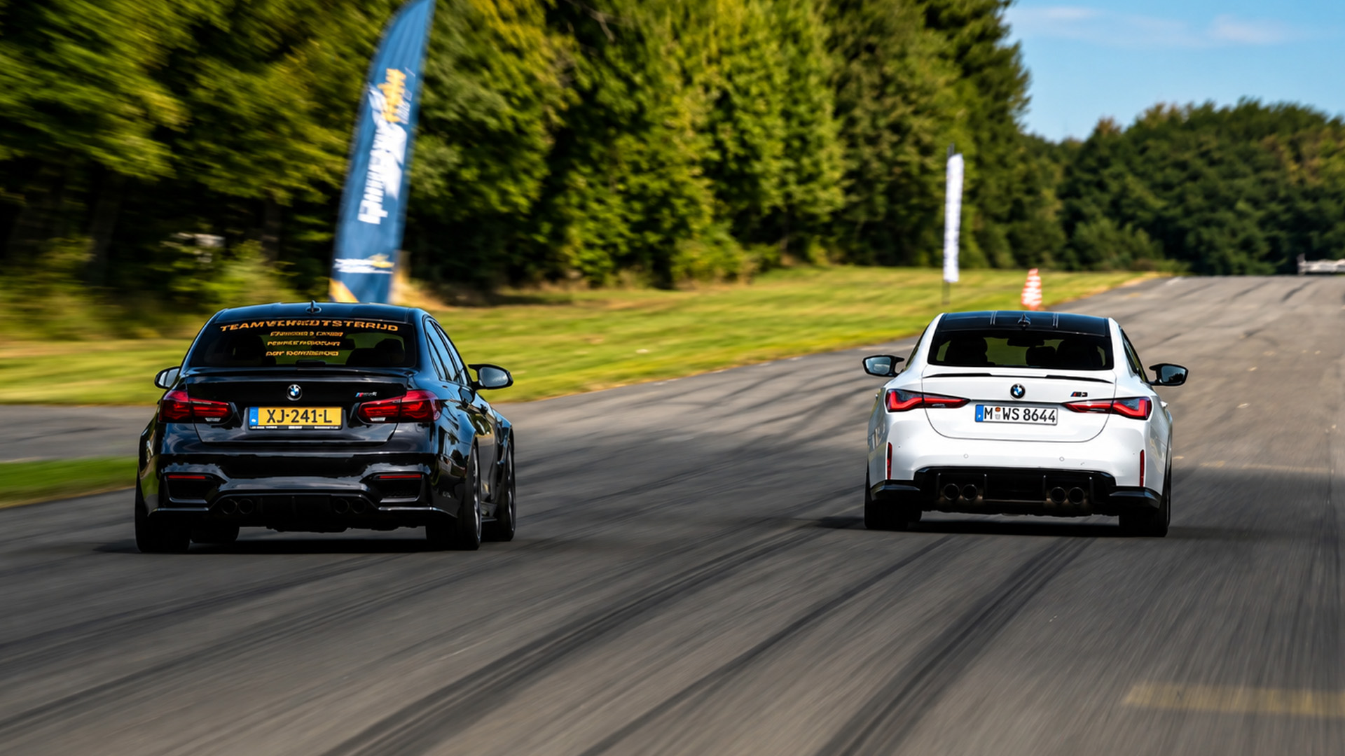 BMW M3 battles BMW M4 in a straight line run