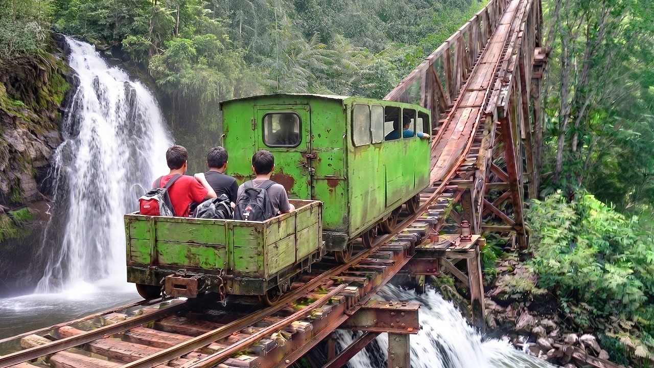 Riding cheapest homemade train in middle of jungle