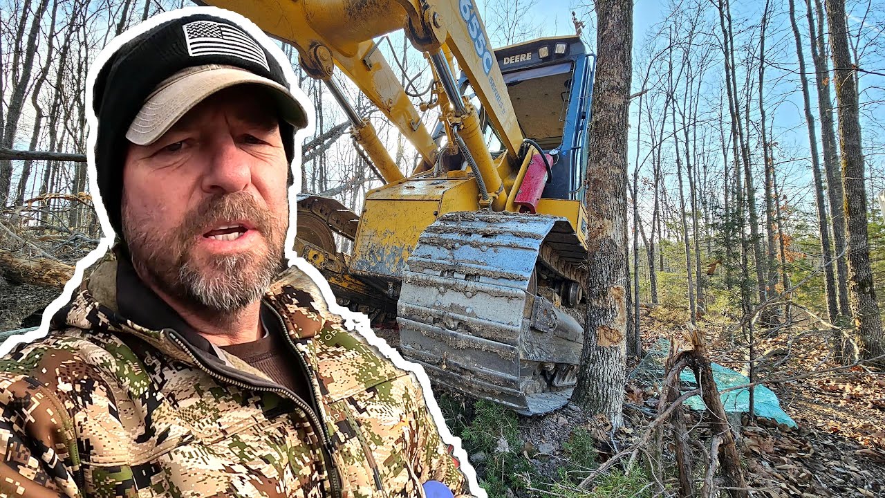 Crawler loader gets stuck during land clearing