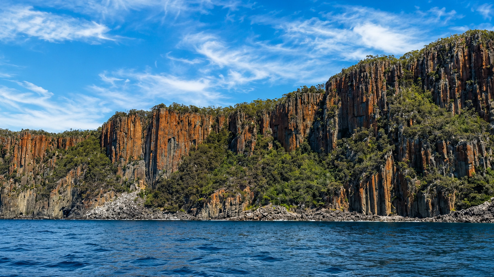 Giant rock columns rising directly from the sea