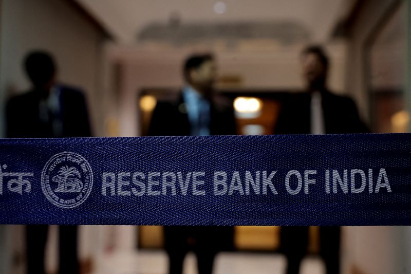 Rupee anchored by central bank hand, traders watchful of oil ructions