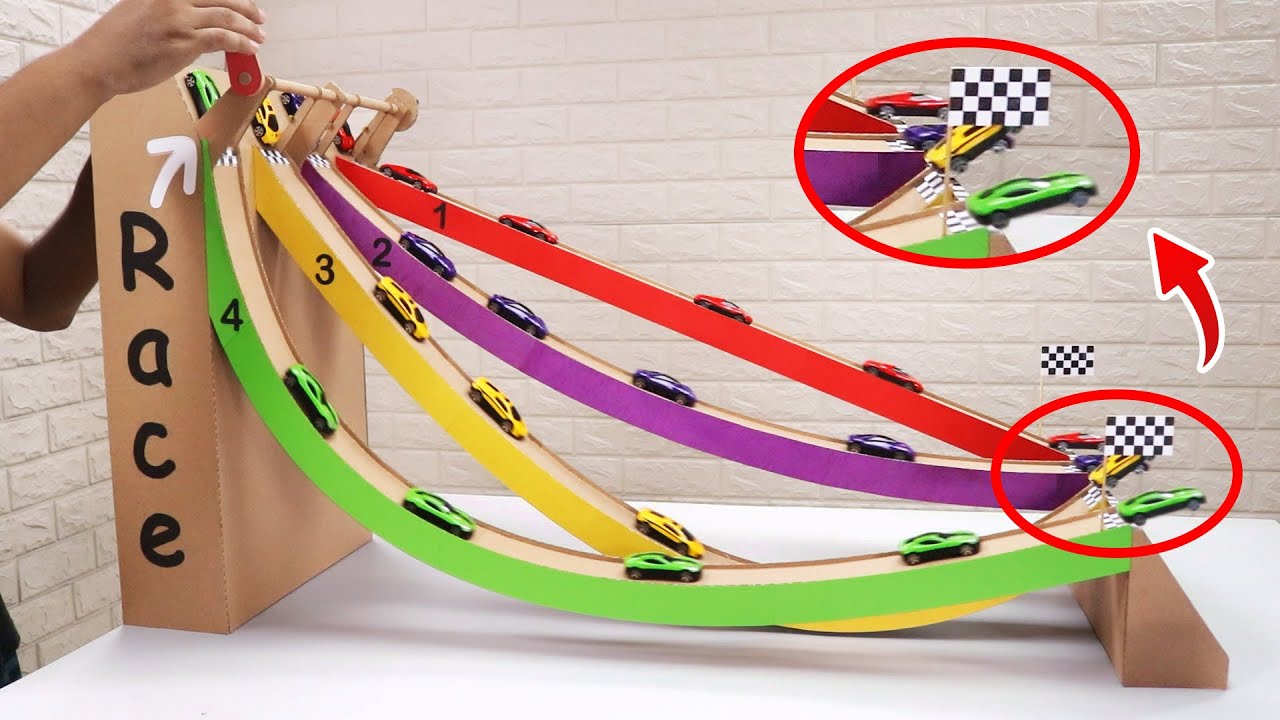 DIY cardboard slide: Epic toy races with cars, buses & balls!