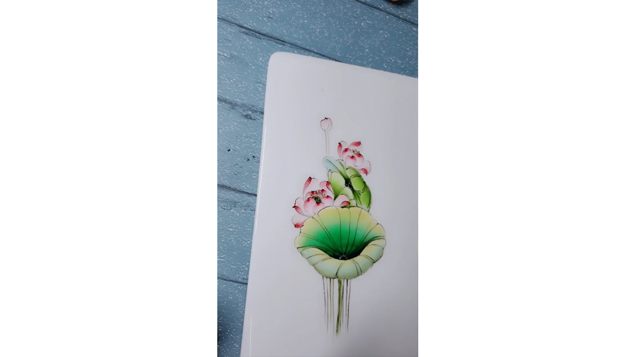 Drawing elegant lotus flowers with green leaves creating delicate ...
