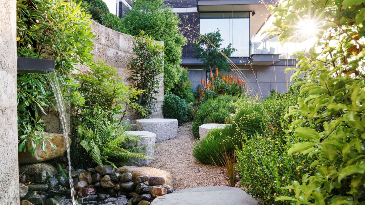 Designers say the best gardens give you 'permission to linger' — here's how
