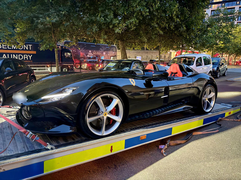 A seized Ferrari Monza being taken to the pound (Met Police)