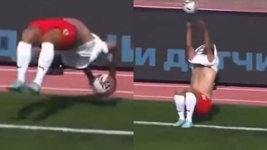 Image for Football's wildest throw-in? Defender somersaults over ball before launching spectacular assist from the touchline