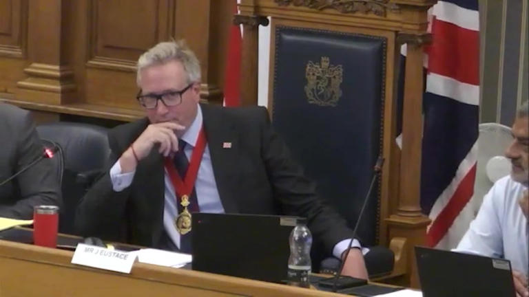 Councillors stage protest by singing national anthem in row with Reform
