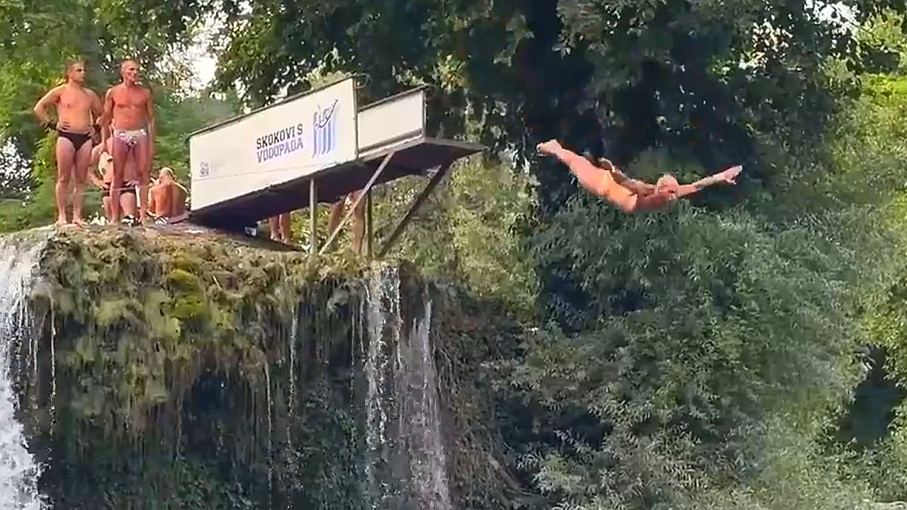 Daredevil athletes plunge headfirst from 72-foot waterfall in Bosnia