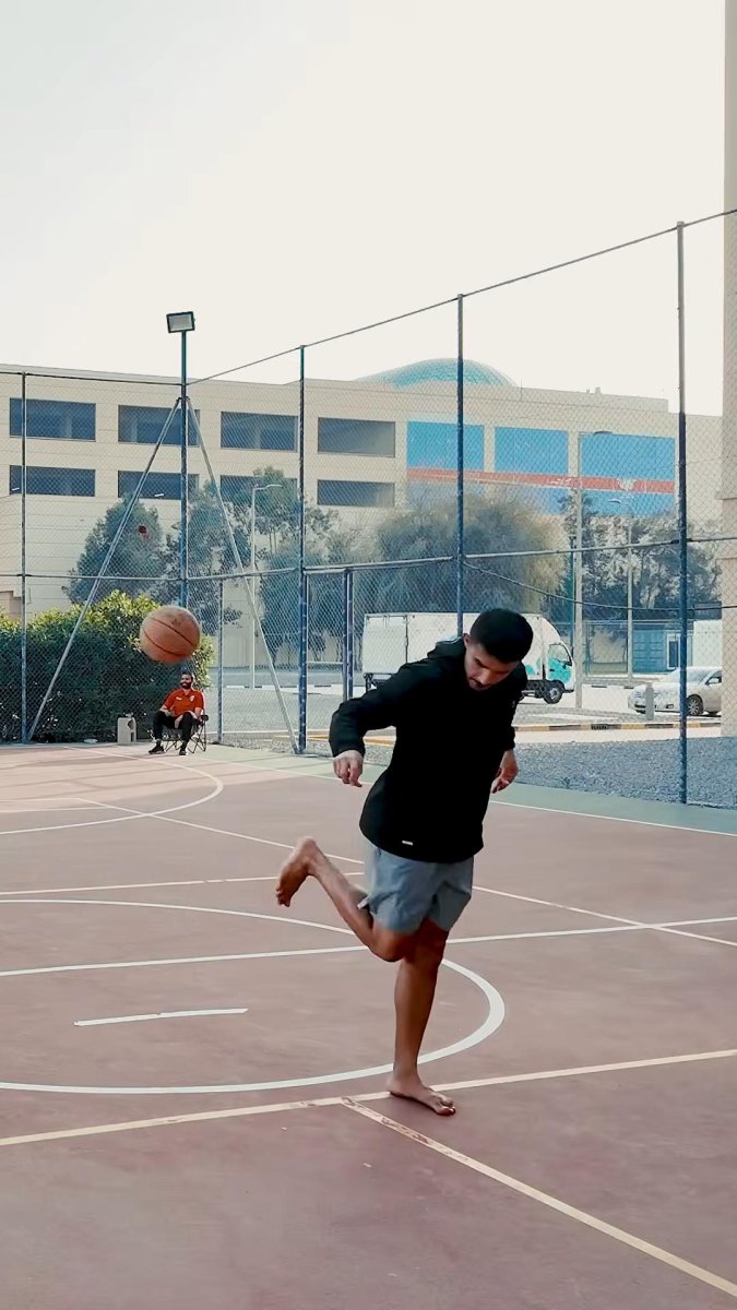 watch-soccer-player-breaks-basketball-world-record-with-backheel-kick