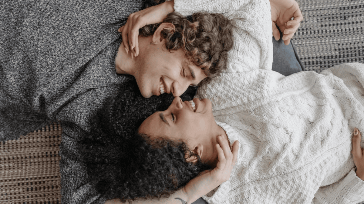 7 body language signs they're secretly falling for you, psychology says