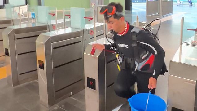 Man rides subway in full scuba gear and doesn't get the reaction he wants