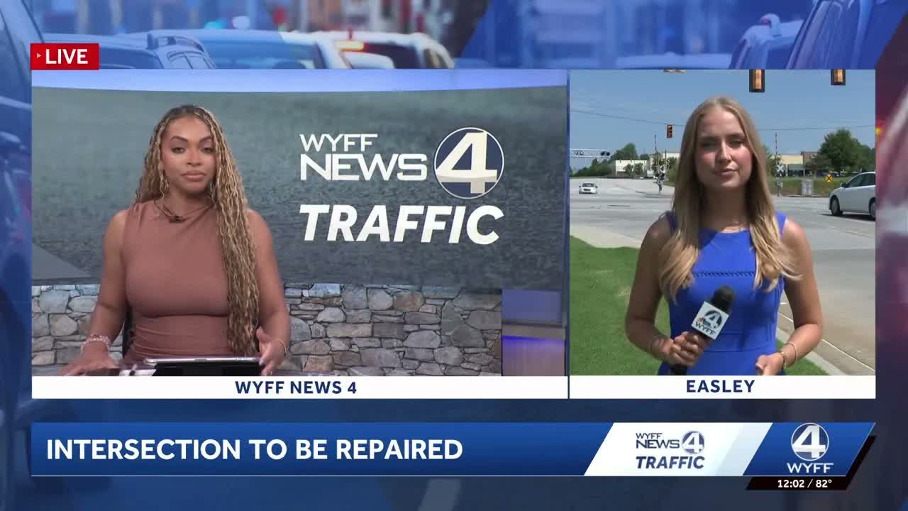Road intersection damaged after crash and fuel spill