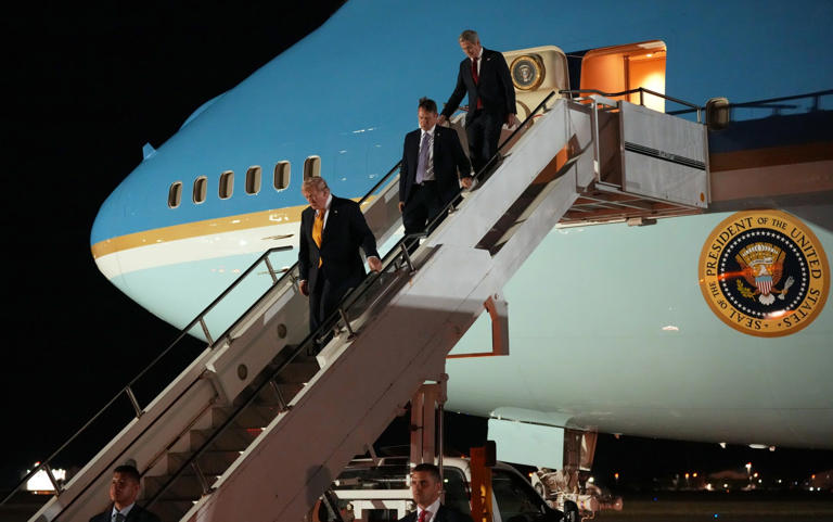 Mr Trump’s secret flight landed at RAF Mildenhall in Suffolk at 10.20pm - Alex Brandon