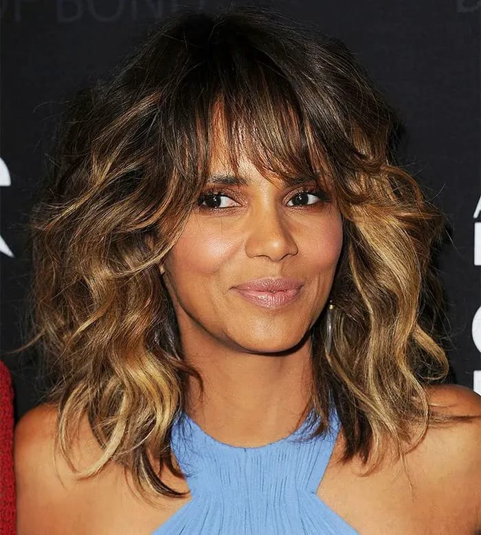 3 stylish medium-length haircuts for women over 40: wispy layered shag ...