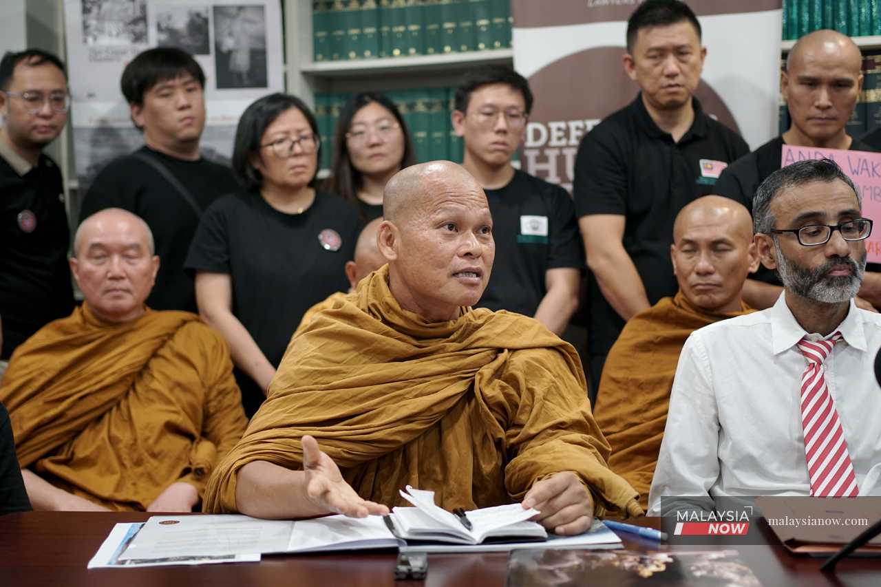 Monks plead with Anwar to save historic Perak caves monastery ...