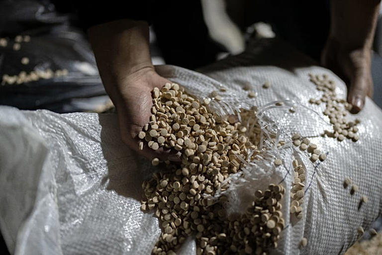 FILE: Syrian forces inspect captagon pills inside a military facility where they were made before the fall of the al-Assad regime on the outskirts of Damascus, 7 January 2025 AP Photo