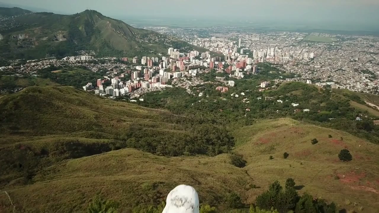 Cali, Colombia: Drone soars over city beneath Andes