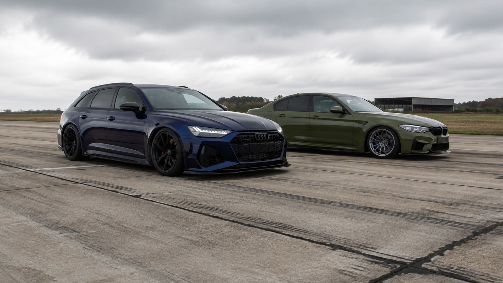 High power cars battle in drag racing runs