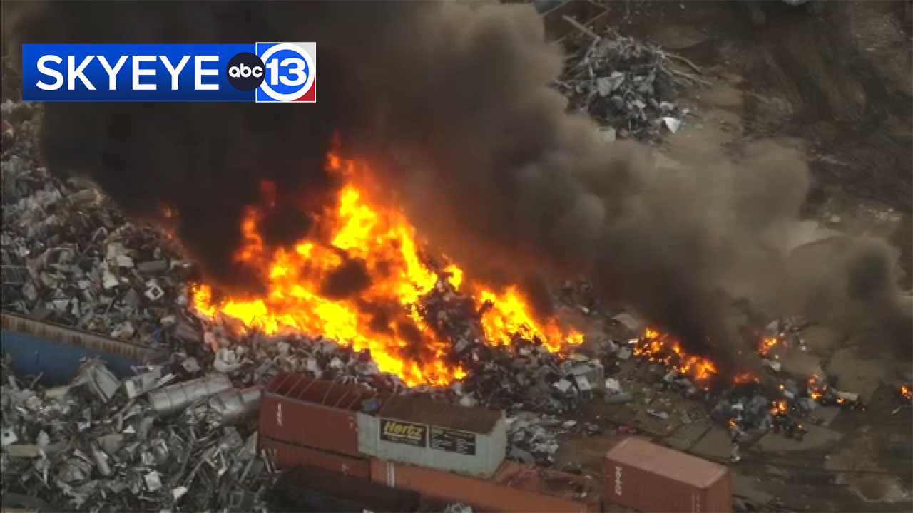 Crews work to put out fire at recycling and scrap metal facility, Houston FD says