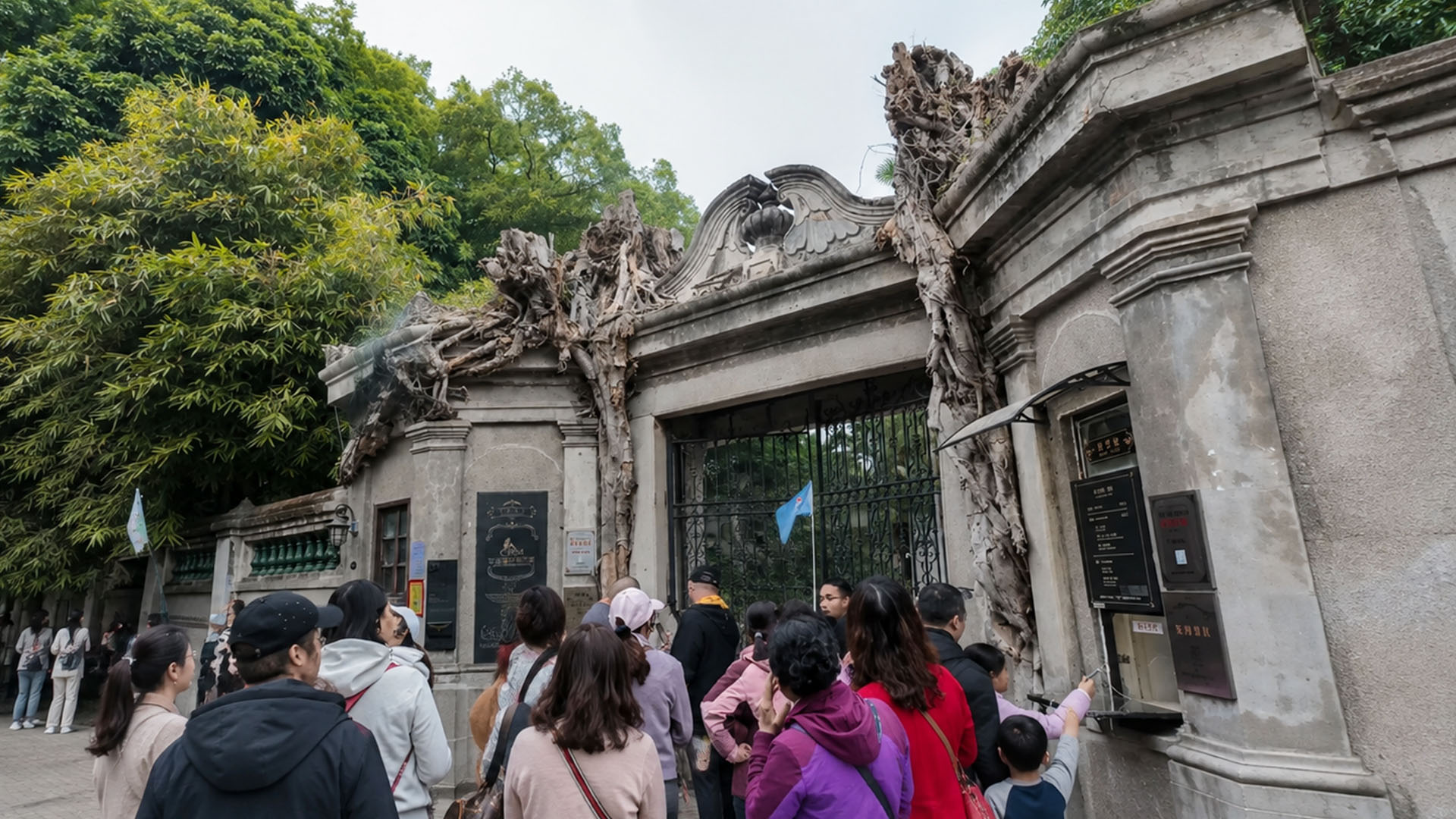 Crowds gather outside a historic gate on China’s island