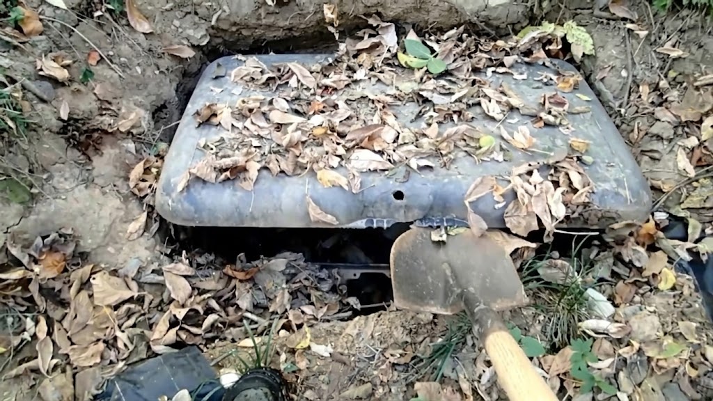 The camp was abandoned. The box was buried... and something was still ...