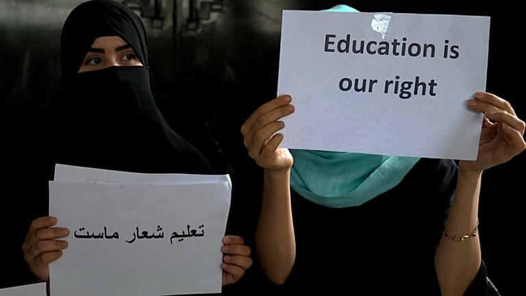 Afghan girls hold an illegal protest to demand the right to education in a private home in Kabul, Afghanistan, 2 August, 2022. AP