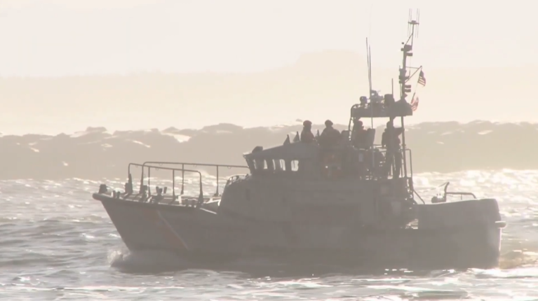 Navy crew spots a massive shape in the water and rushes to investigate