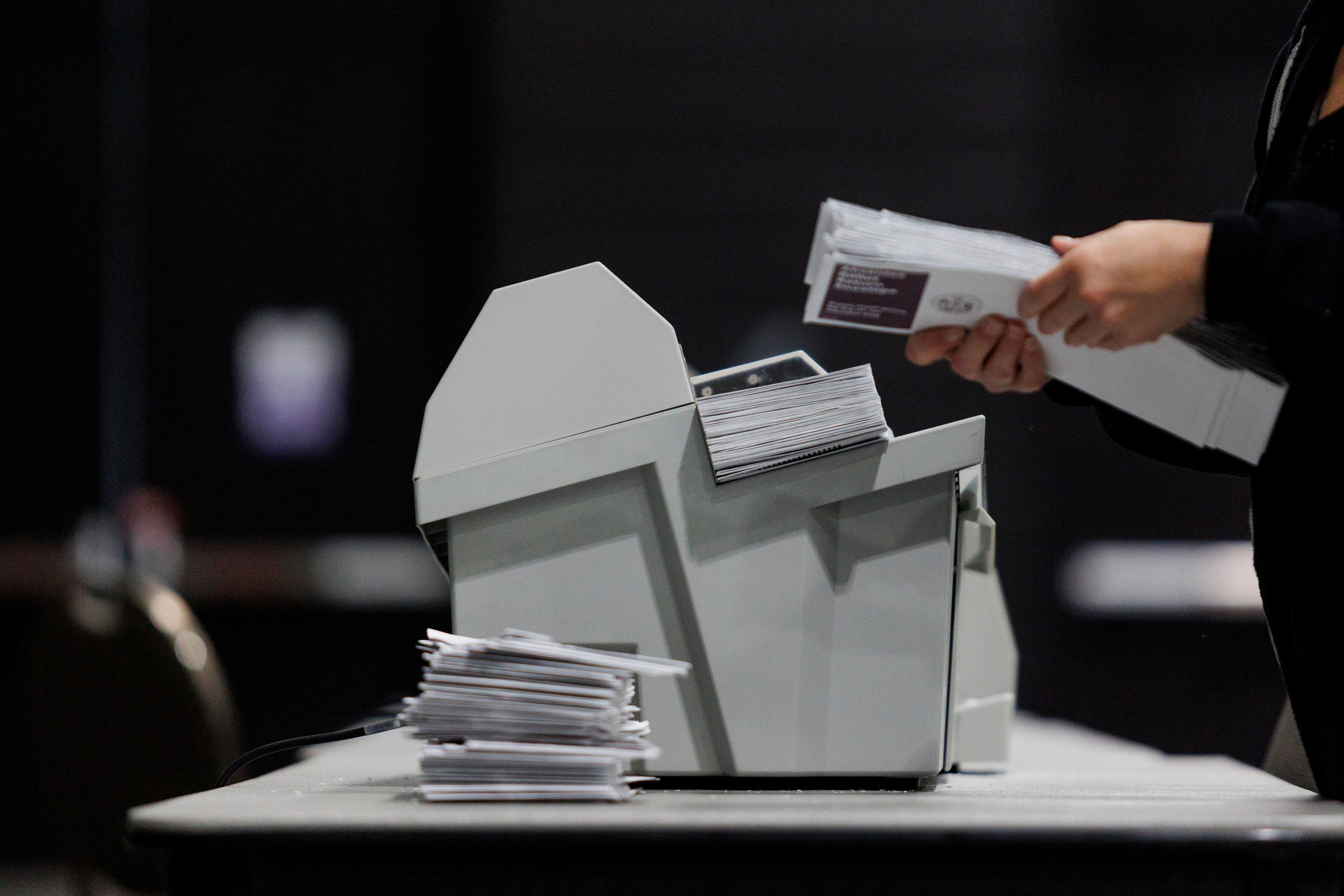 Federal judge blocks Trump’s efforts to restrict mail-in voting nationwide
