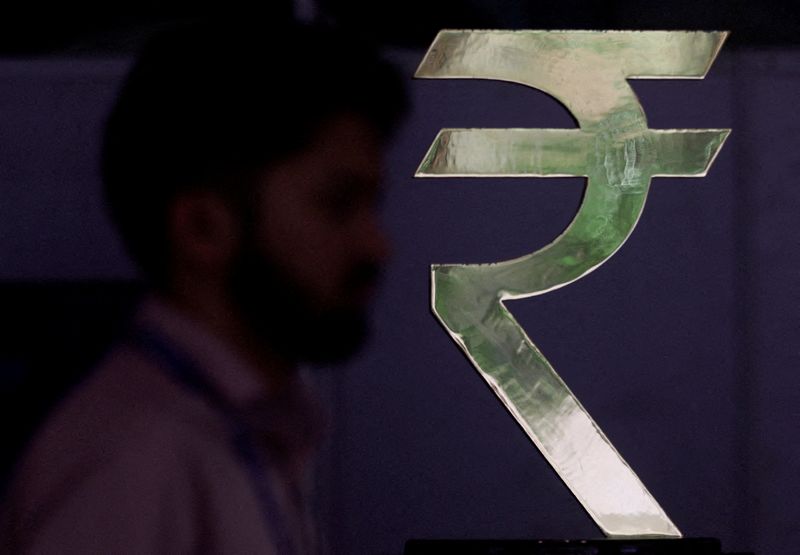 Oil-driven dollar demand to pressure rupee; RBI blunts losses