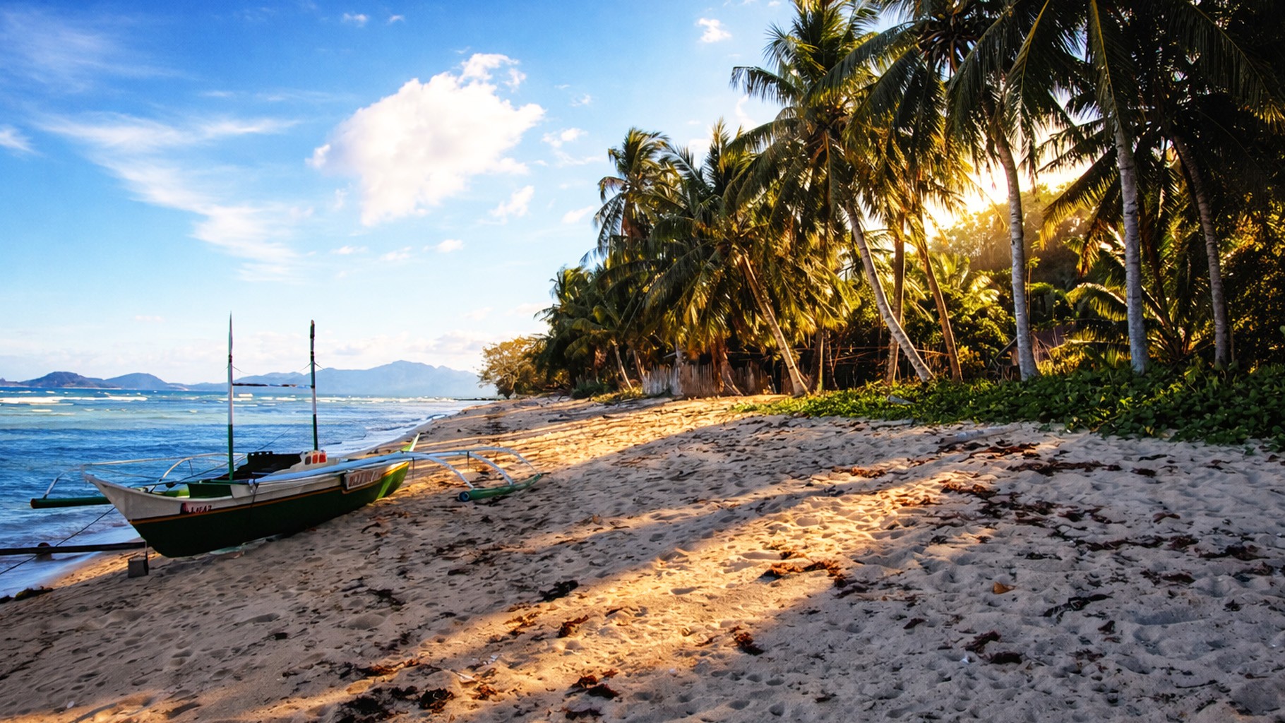 Walking along a palm-lined beach in El Nido, Palawan (4K)