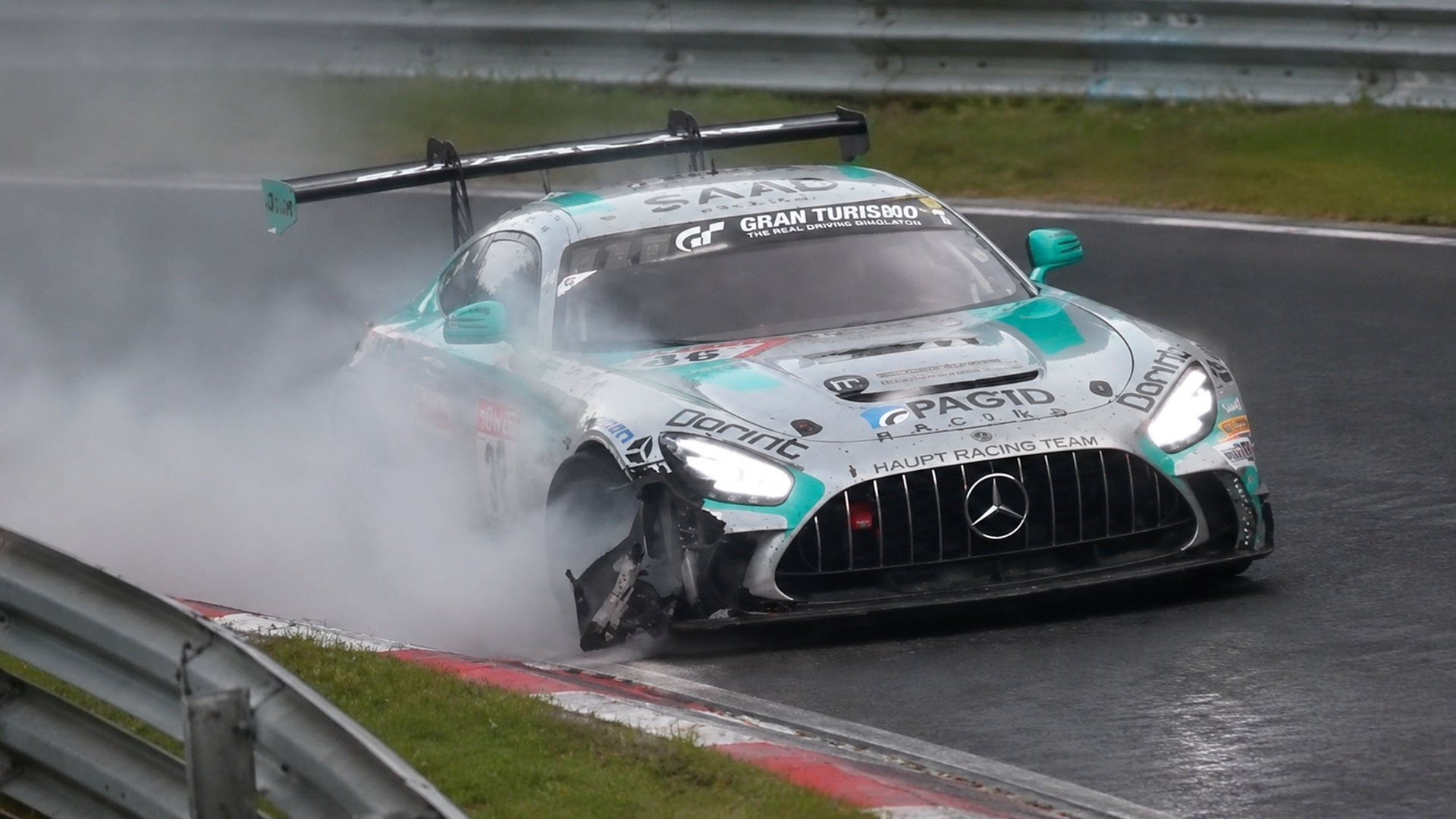 Damaged racing car keeps moving after a dramatic Nürburgring crash