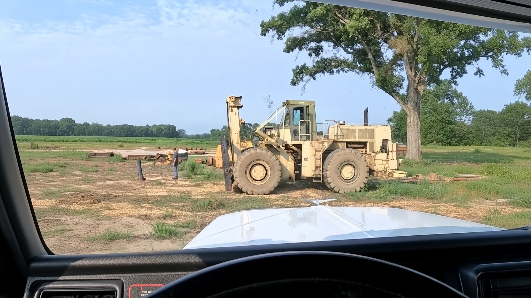 Rotator vs military 988 loader