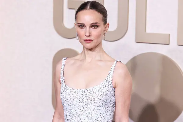 Pregnant Natalie Portman spotted with new boyfriend on rare Paris movie date