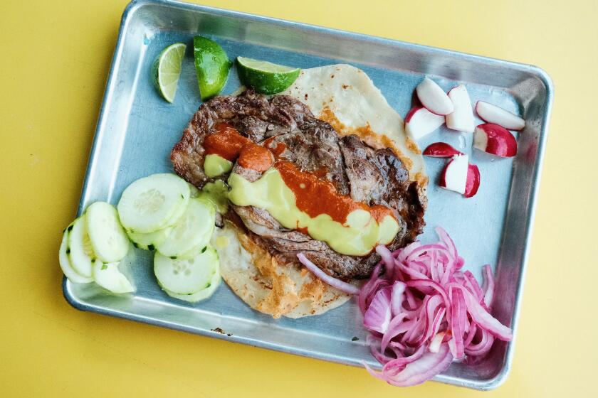 With fresh flour tortillas and mesquite meats, one of LA.'s top taqueros debuts first restaurant