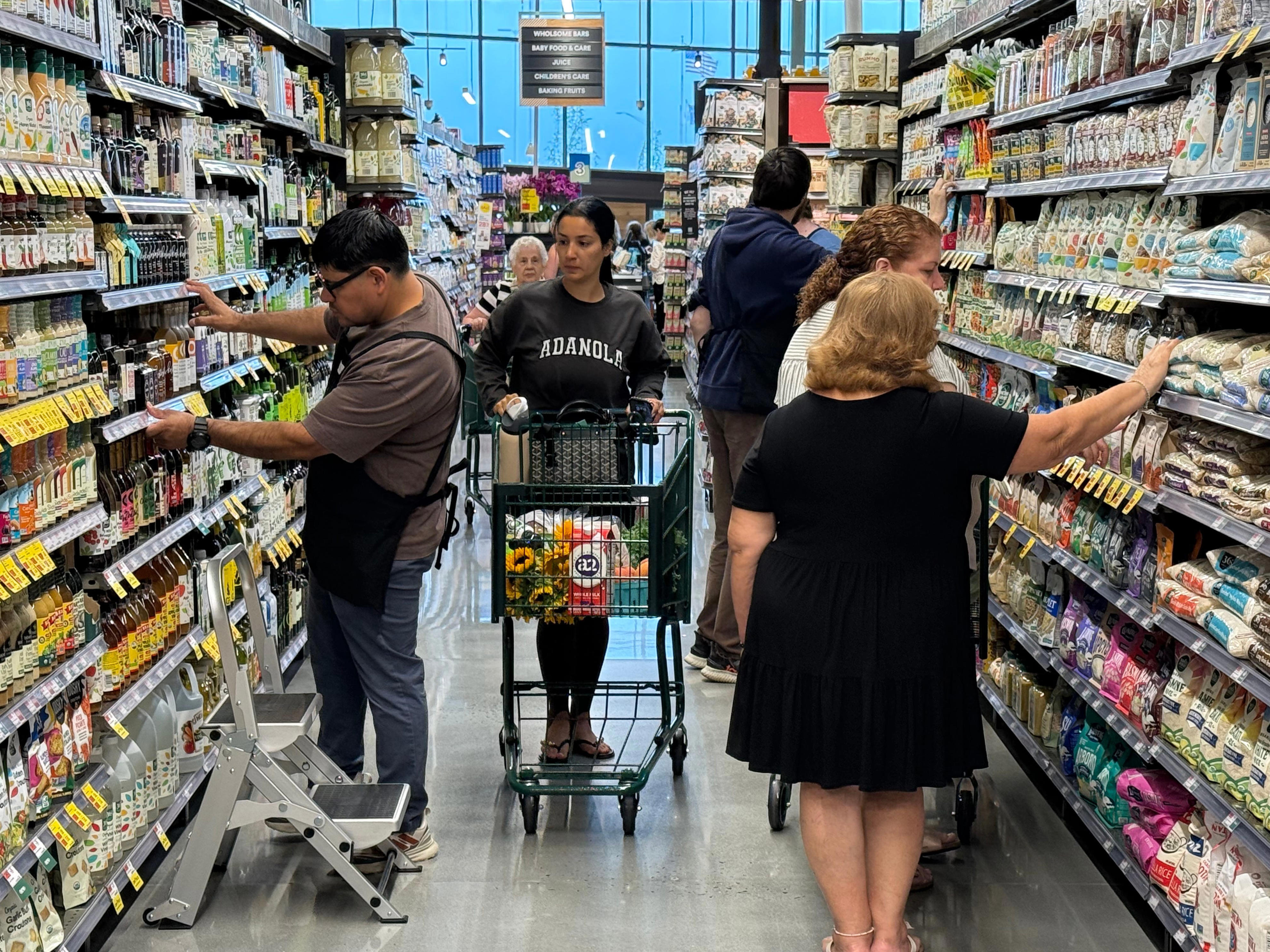 CPI report shows inflation cooled again, but still outpaced paychecks in July