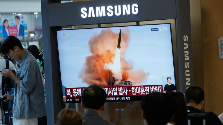 A news report on North Korea's missile launch being shown at Seoul Railway Station in South Korea. Pic: AP