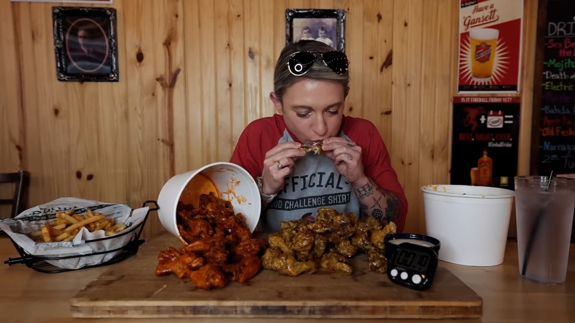 Girl tries to eat 2 entire buckets of wings in 45 minutes