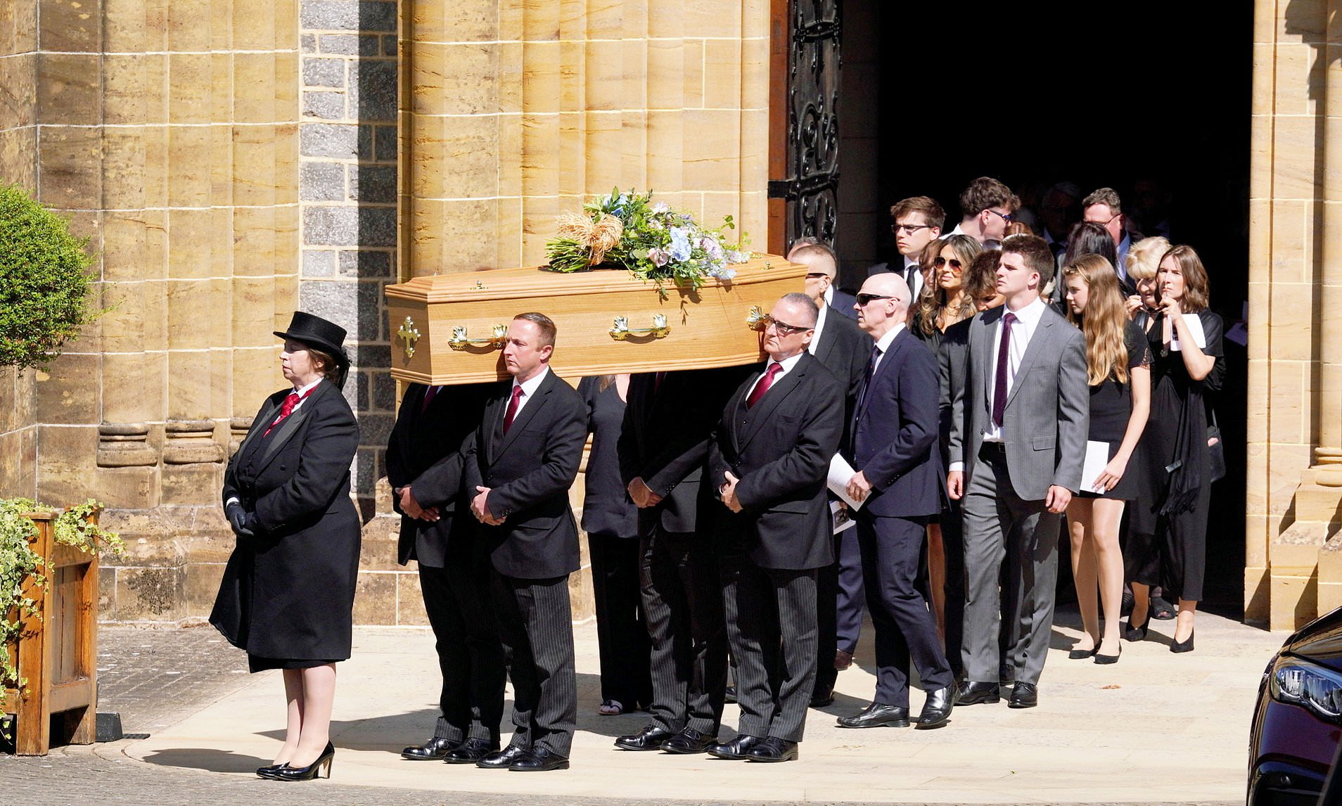 Mourners pay their respects to 'murdered' Ann Widdecombe as she is laid to rest near Devon home