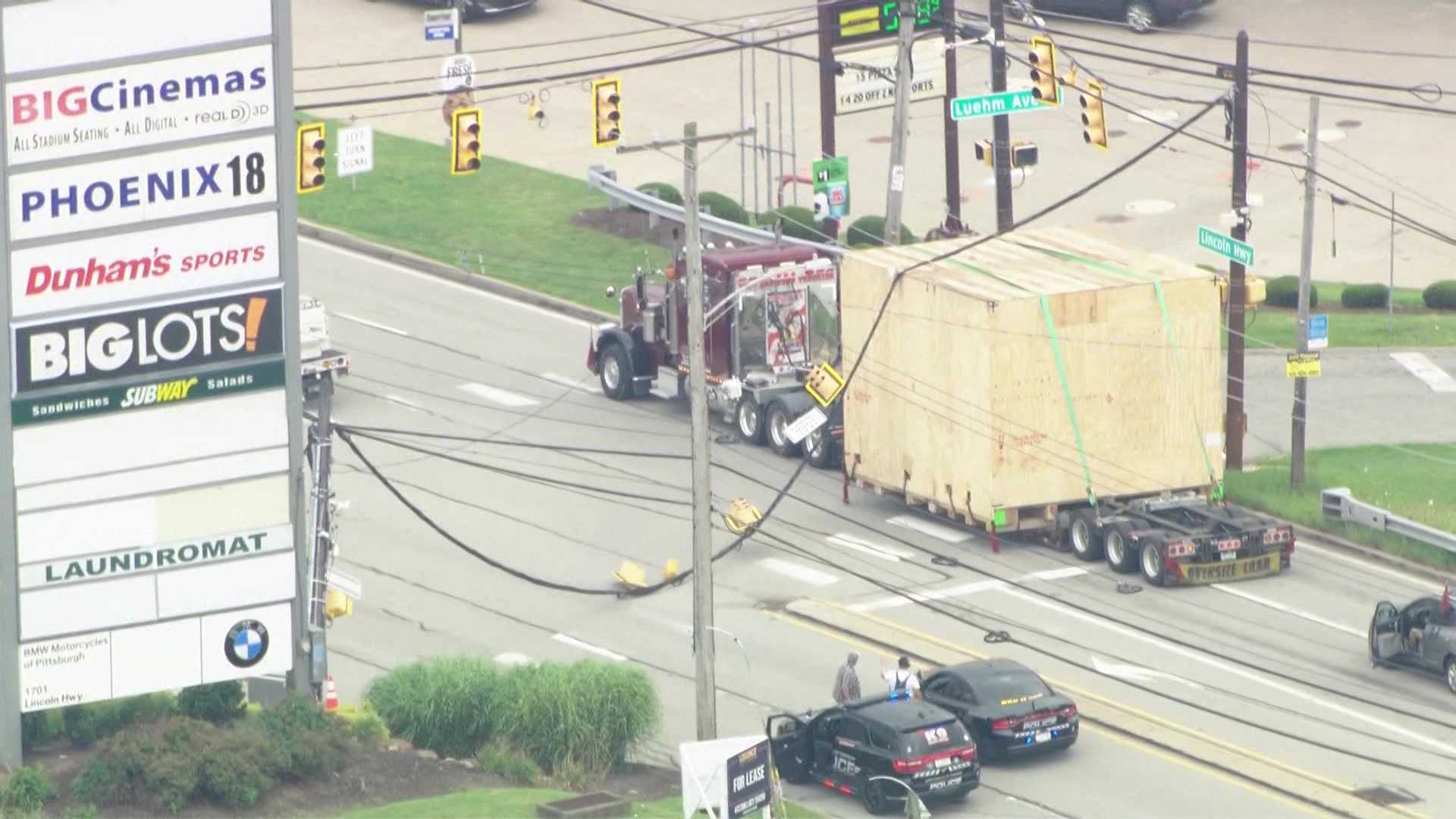 Route 30 closed after oversized load takes out traffic light in North ...
