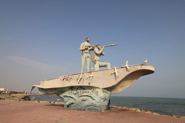 A sculpture overlooking the Strait of Hormuz is seen along the seafront in the port city of Bandar Abbas, in southern Iran on Monday, August 10, 2026. AFP via Getty Images