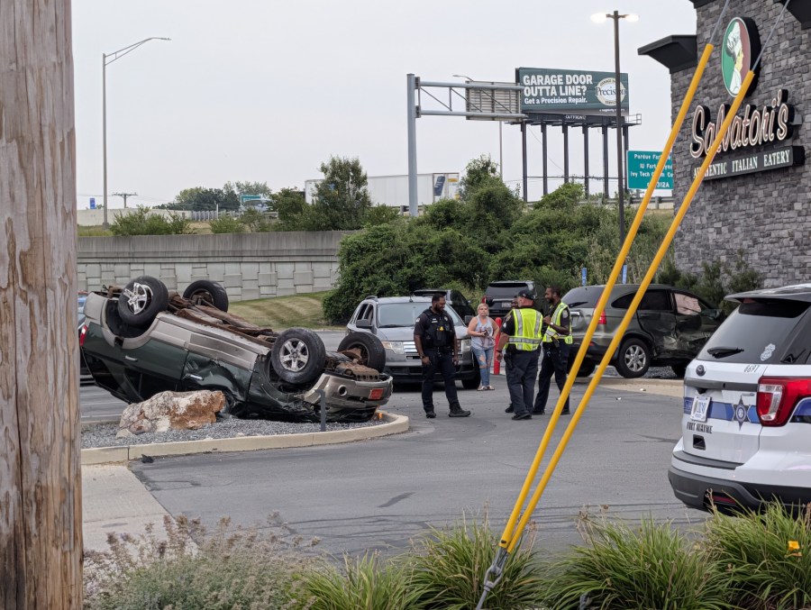 Video: Collision flips car, sends other into restaurant