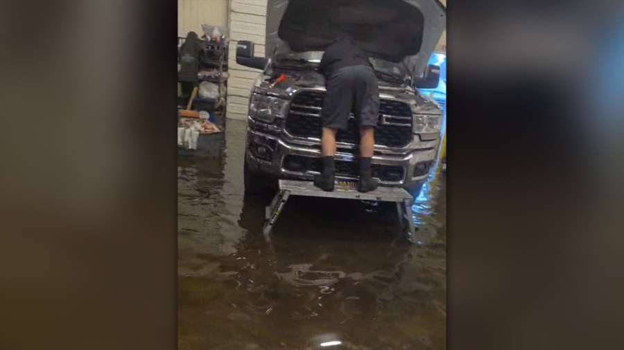 Lakeland auto body shop flooded with 2 feet of water after thunderstorms