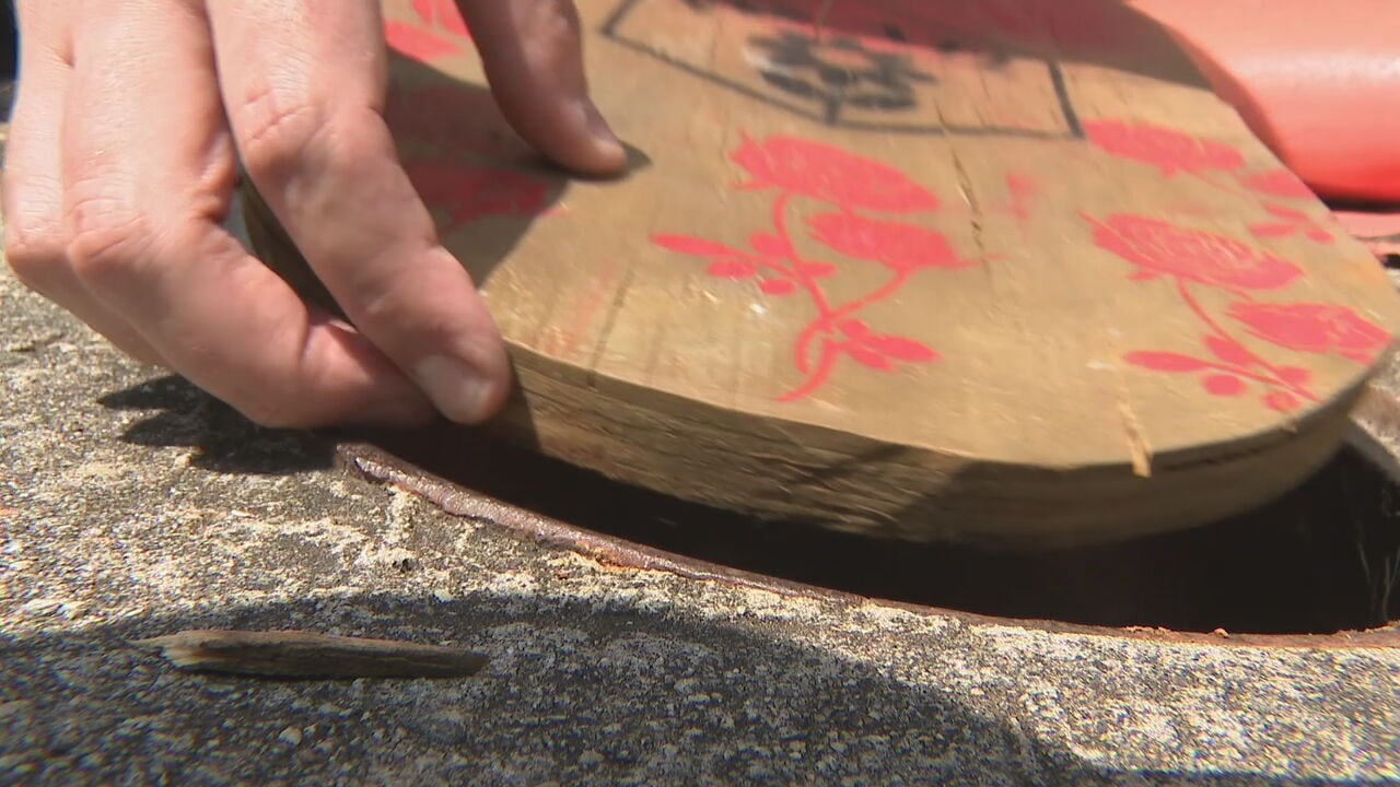 Dozens of open utility holes covered by volunteers while they await Atlanta's fix