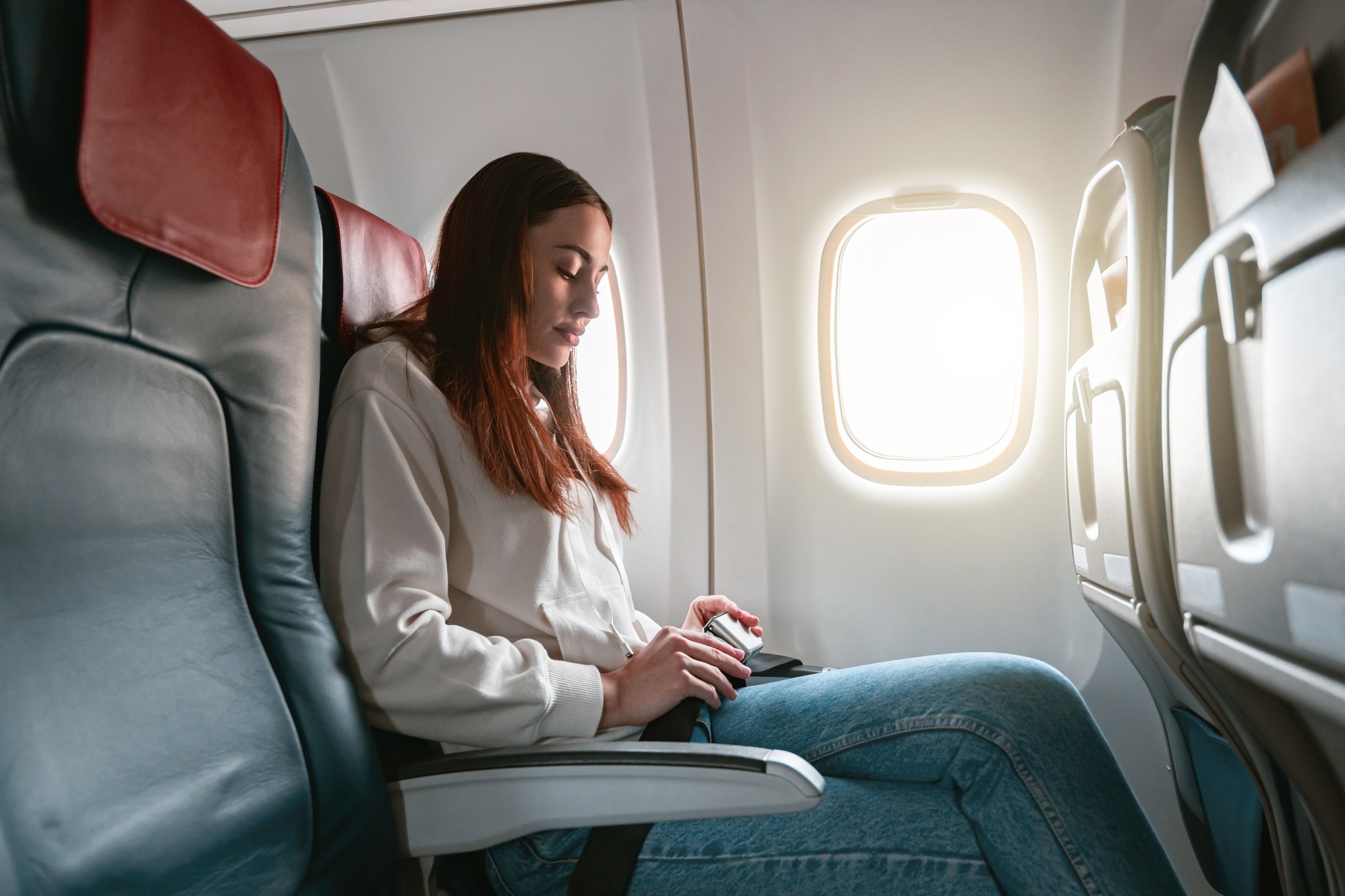 A traveler got an empty row on a 13-hour flight. Then another family moved in