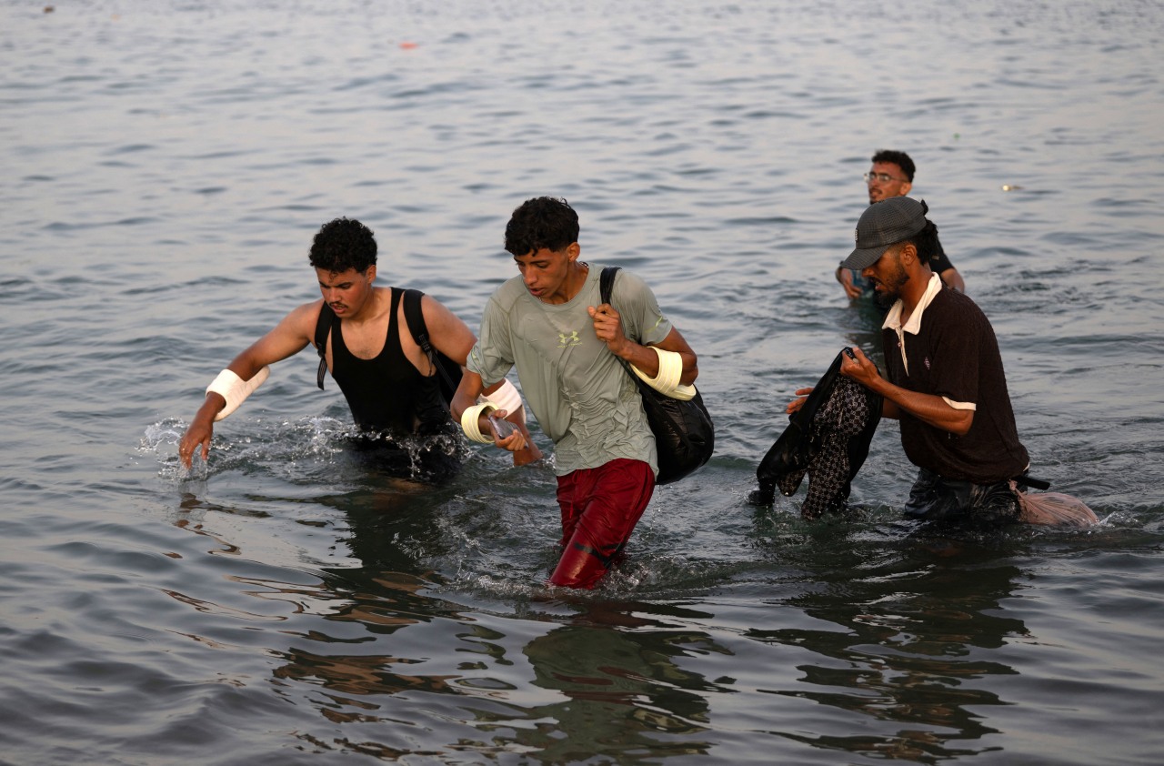 Spain says most immigrants who overran its African enclave have left