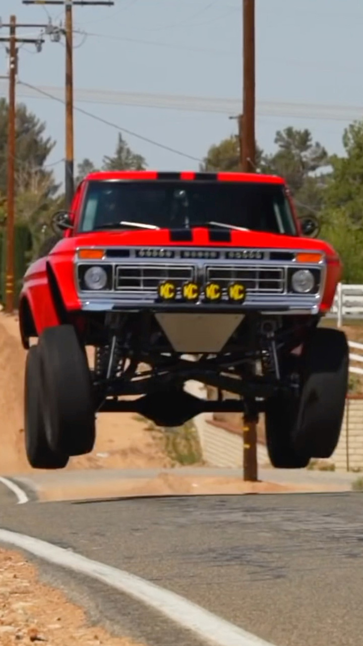 Custom Ford truck performs extreme high flying airborne jump action